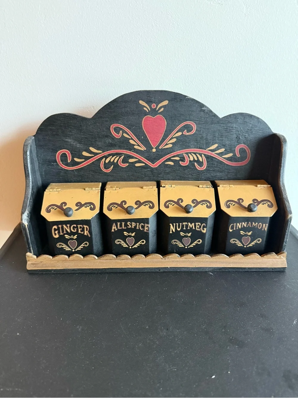 Vintage Folkart tin spice containers with wooden shelf
